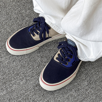 Μοντέρνα ανδρικά αθλητικά παπούτσια από καμβά 2025 Καλοκαιρινά νέα βουλκανισμένα casual παπούτσια Μοντέρνα ευέλικτα χαμηλοτάβανα ανδρικά φλατ παπούτσια