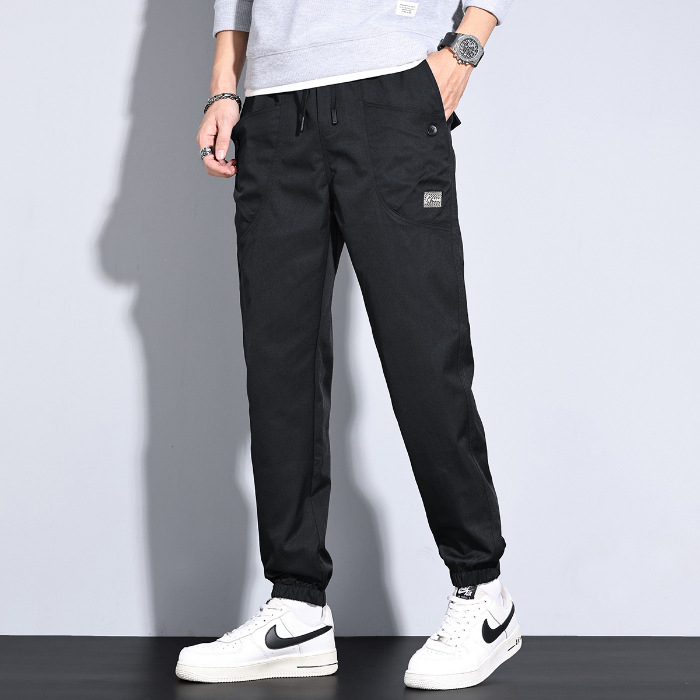 Új 2025-ös tavaszi és nyári laza, egyenes szárú, hárem cargo nadrág, stílusos, többzsebes, lezser, férfiaknak való cargo nadrág, divatos