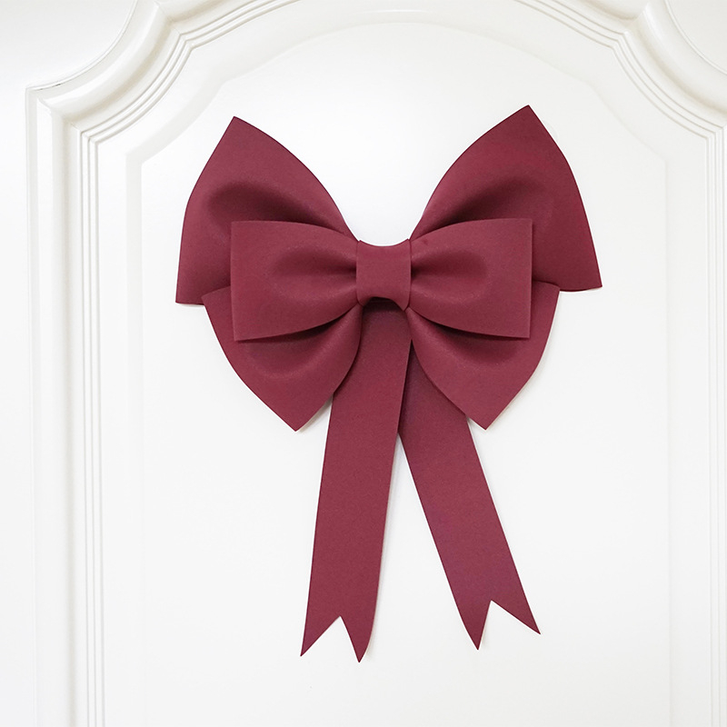 Ülisuur lipsuga materjalist kott sünnipäevatoa kaunistamine pulmapühade peokaunistused tausta seinale paigutus