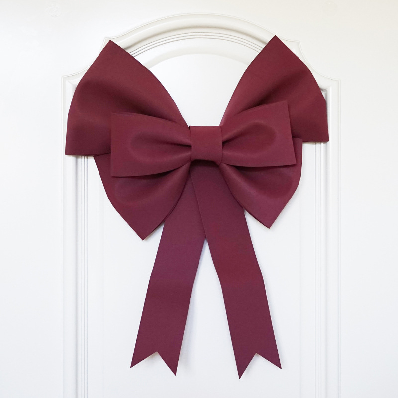 Ülisuur lipsuga materjalist kott sünnipäevatoa kaunistamine pulmapühade peokaunistused tausta seinale paigutus