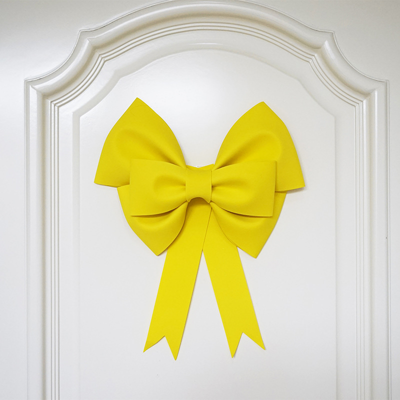 Ülisuur lipsuga materjalist kott sünnipäevatoa kaunistamine pulmapühade peokaunistused tausta seinale paigutus