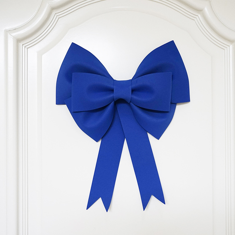 Ülisuur lipsuga materjalist kott sünnipäevatoa kaunistamine pulmapühade peokaunistused tausta seinale paigutus