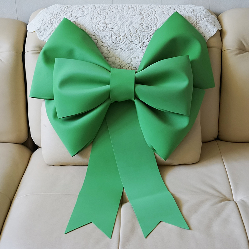 Ülisuur lipsuga materjalist kott sünnipäevatoa kaunistamine pulmapühade peokaunistused tausta seinale paigutus