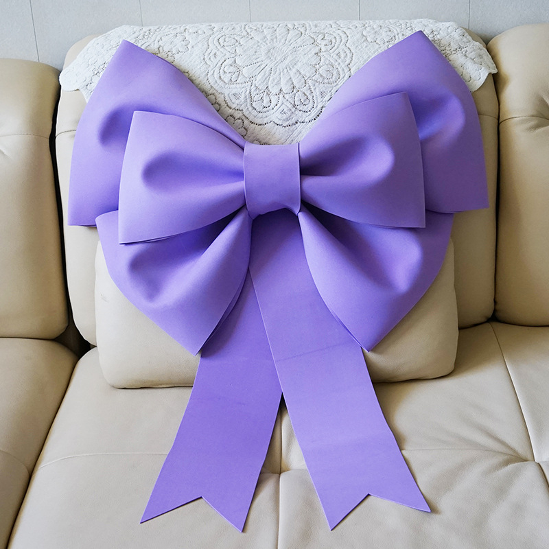 Ülisuur lipsuga materjalist kott sünnipäevatoa kaunistamine pulmapühade peokaunistused tausta seinale paigutus