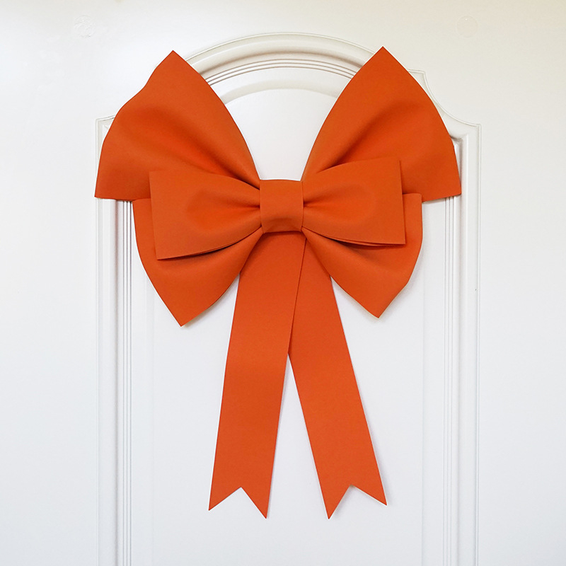 Ülisuur lipsuga materjalist kott sünnipäevatoa kaunistamine pulmapühade peokaunistused tausta seinale paigutus