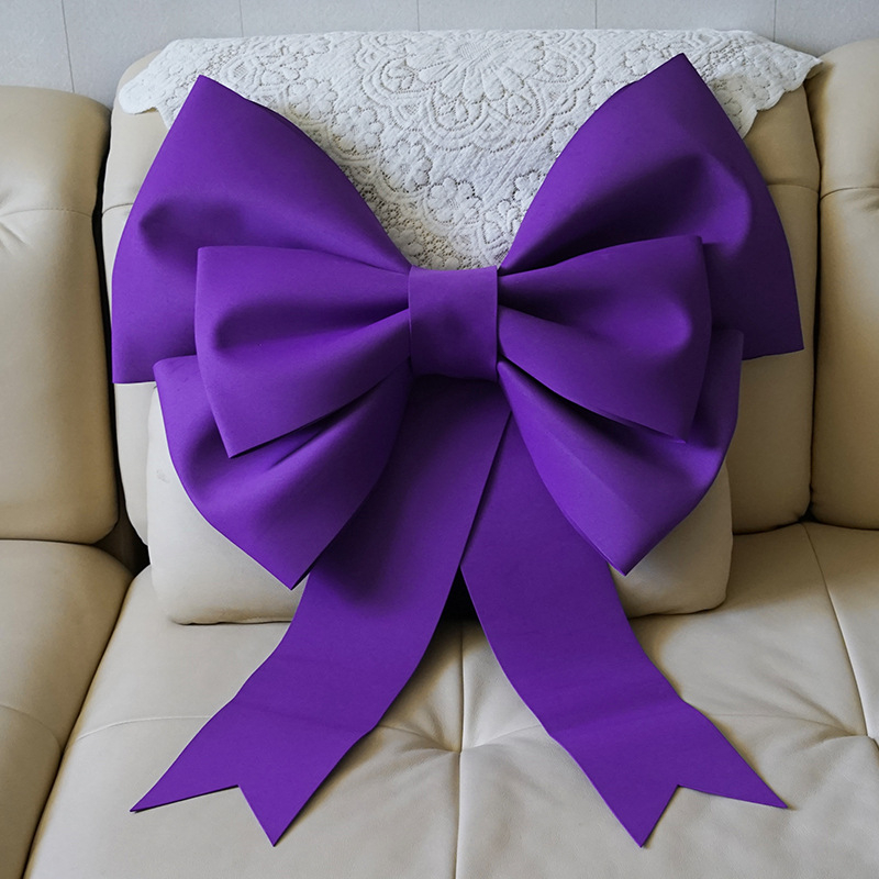 Ülisuur lipsuga materjalist kott sünnipäevatoa kaunistamine pulmapühade peokaunistused tausta seinale paigutus