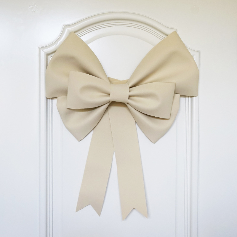 Ülisuur lipsuga materjalist kott sünnipäevatoa kaunistamine pulmapühade peokaunistused tausta seinale paigutus