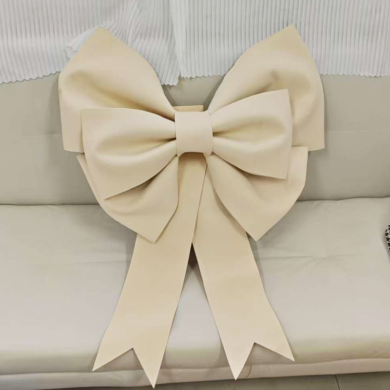 Ülisuur lipsuga materjalist kott sünnipäevatoa kaunistamine pulmapühade peokaunistused tausta seinale paigutus