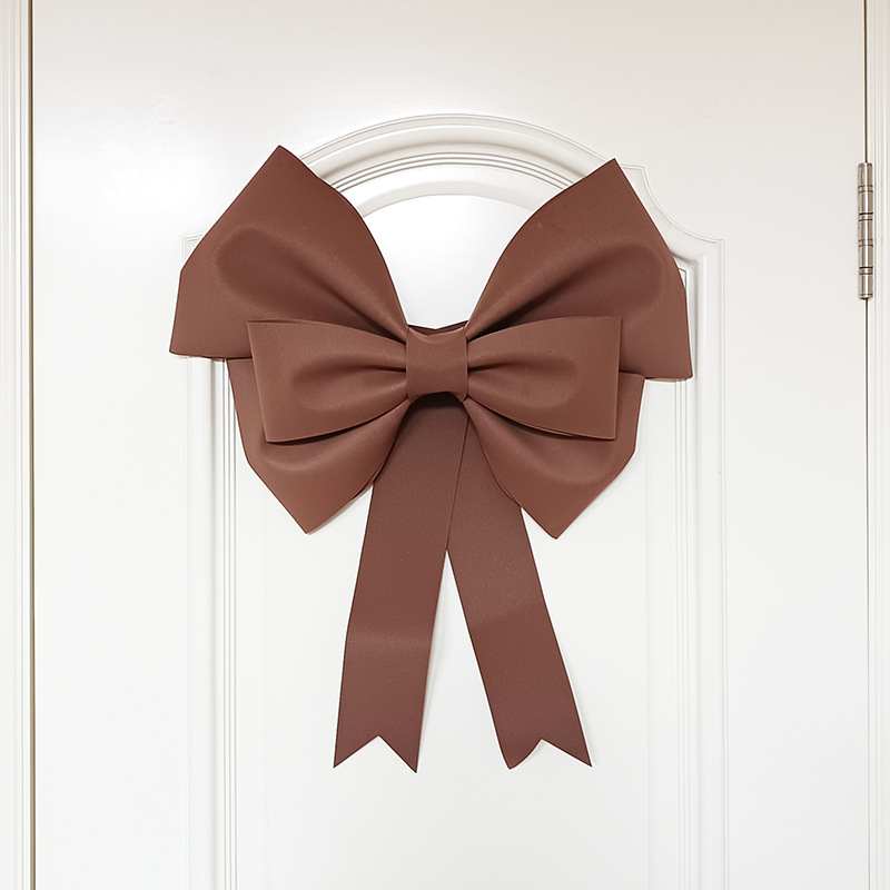 Ülisuur lipsuga materjalist kott sünnipäevatoa kaunistamine pulmapühade peokaunistused tausta seinale paigutus