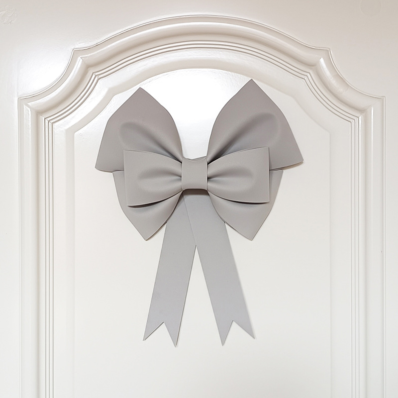 Ülisuur lipsuga materjalist kott sünnipäevatoa kaunistamine pulmapühade peokaunistused tausta seinale paigutus