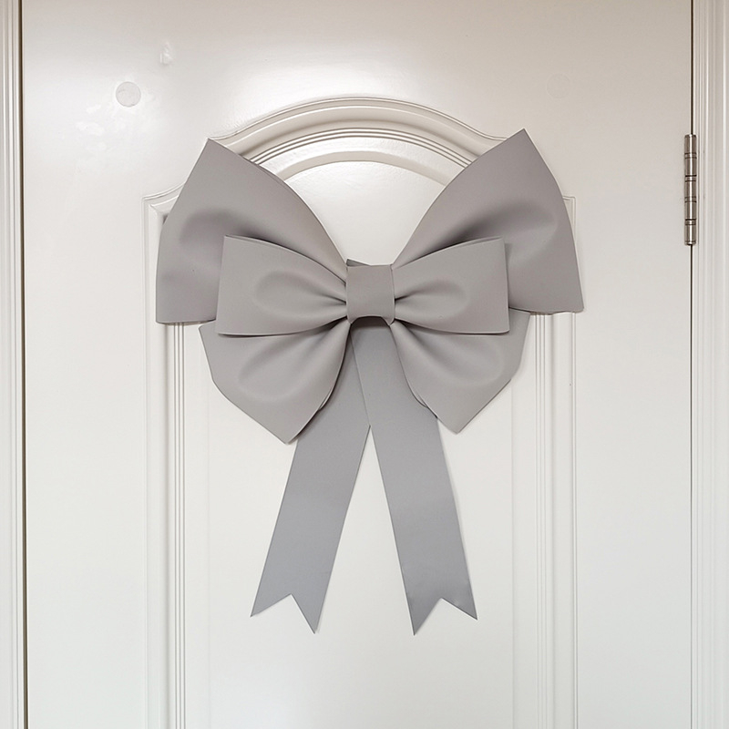 Ülisuur lipsuga materjalist kott sünnipäevatoa kaunistamine pulmapühade peokaunistused tausta seinale paigutus