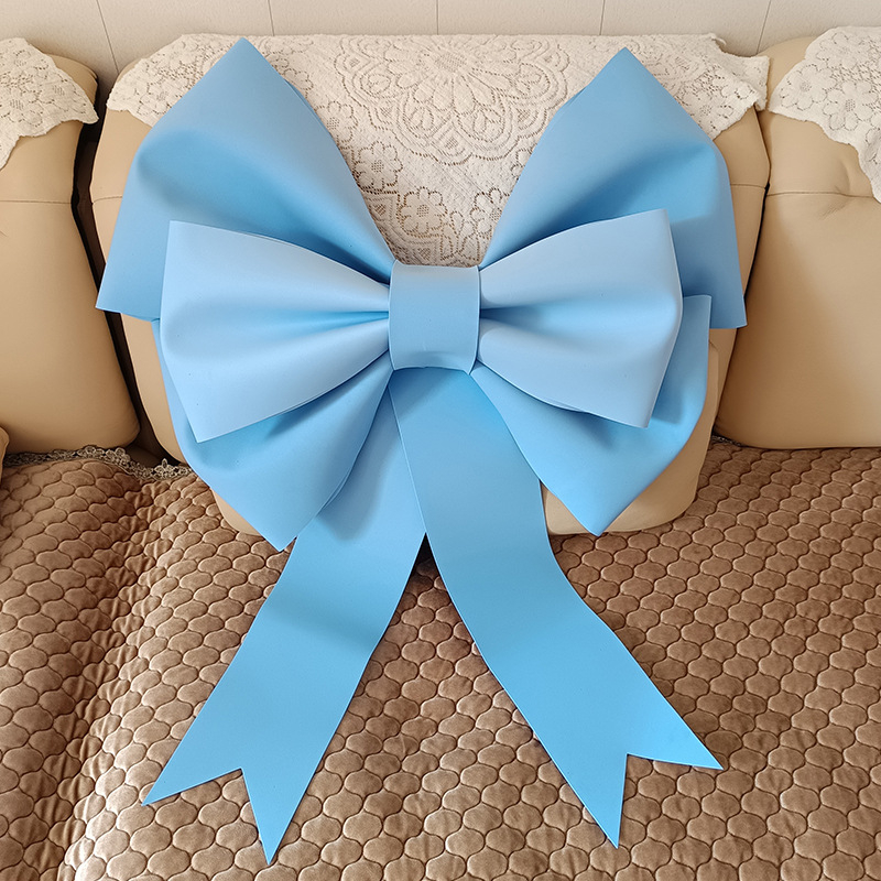 Ülisuur lipsuga materjalist kott sünnipäevatoa kaunistamine pulmapühade peokaunistused tausta seinale paigutus