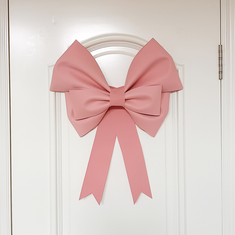 Ülisuur lipsuga materjalist kott sünnipäevatoa kaunistamine pulmapühade peokaunistused tausta seinale paigutus