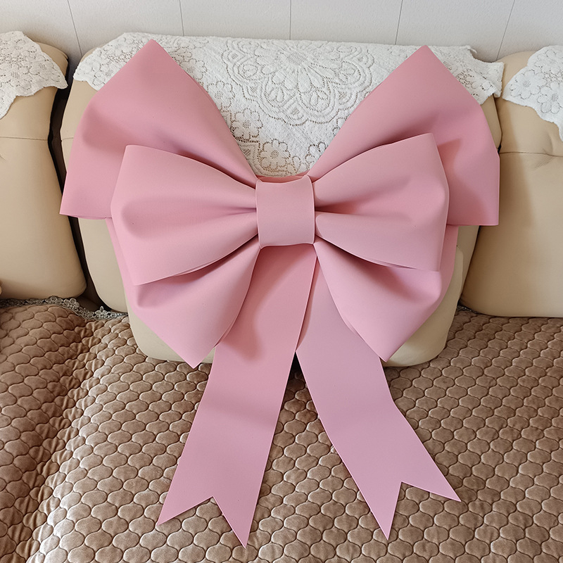 Ülisuur lipsuga materjalist kott sünnipäevatoa kaunistamine pulmapühade peokaunistused tausta seinale paigutus