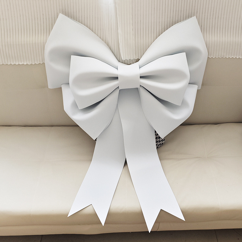 Ülisuur lipsuga materjalist kott sünnipäevatoa kaunistamine pulmapühade peokaunistused tausta seinale paigutus