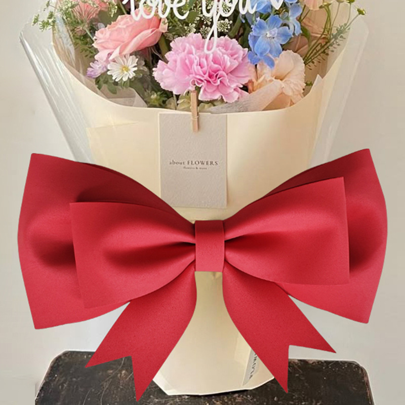 Ülisuur lipsuga materjalist kott sünnipäevatoa kaunistamine pulmapühade peokaunistused tausta seinale paigutus