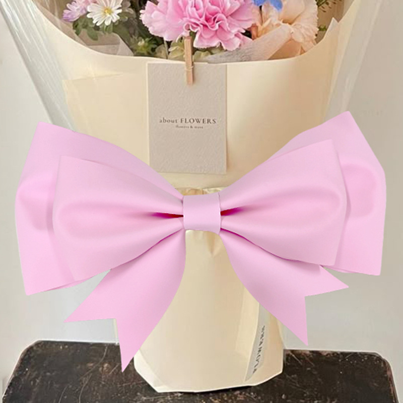 Ülisuur lipsuga materjalist kott sünnipäevatoa kaunistamine pulmapühade peokaunistused tausta seinale paigutus