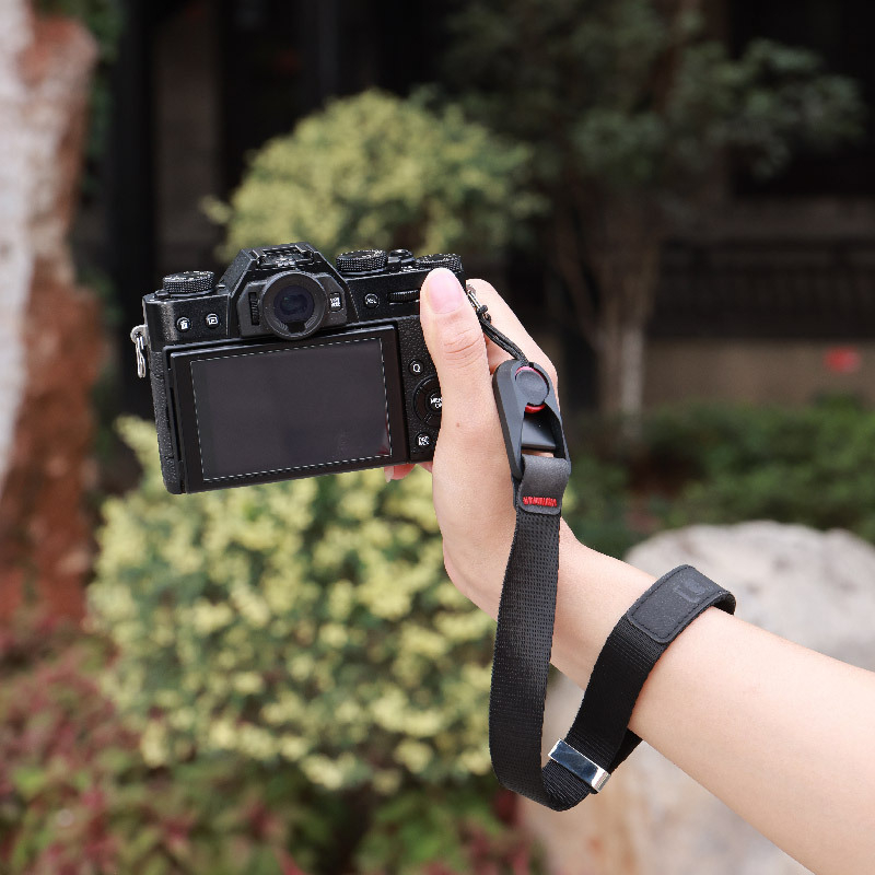 Greito atkabinimo fotoaparato riešo dirželis, skirtas vienai SLR mikro kameros riešo dirželiui, magnetiniam prisisiurbimui ir apsaugai nuo nuėmimo, greitai išardomas vienos rankos riešo dirželis.