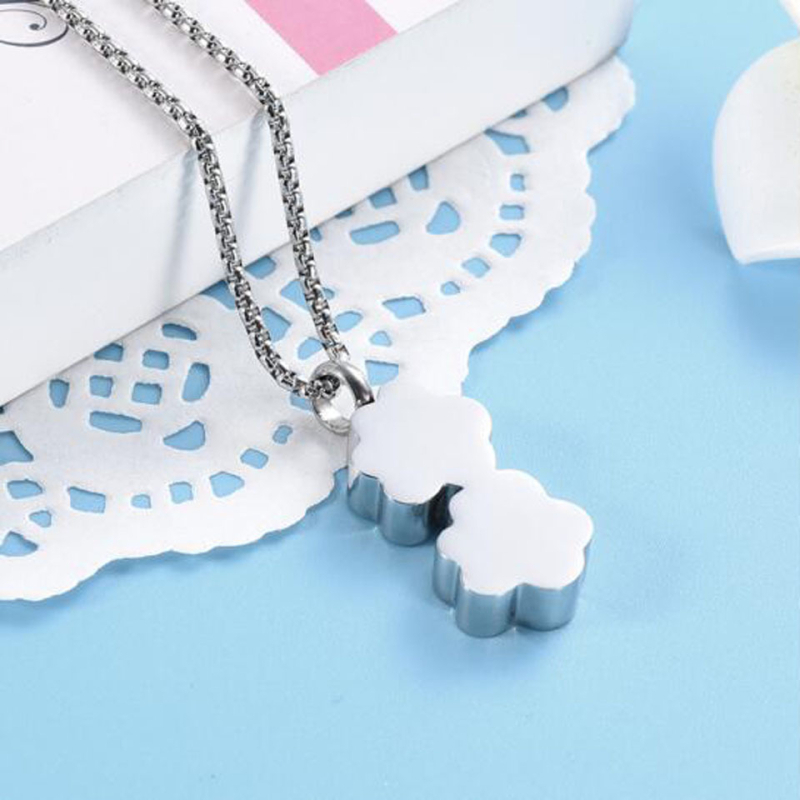 Europoje ir Amerikoje populiarūs 316L nerūdijančio plieno kolonos formos augintinių pėdsakai, deimantais įterptas kvepalų buteliuko pakabukas, rūdos karstas, atminimo ženklas