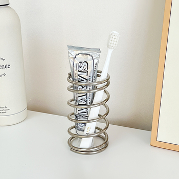 Paprastas nerūdijančio plieno spyruoklinis dantų šepetėlių stovas, tualeto stovas, tualetinis staliukas, kosmetikos šepetėlių laikymo stovas, rašiklio laikiklis
