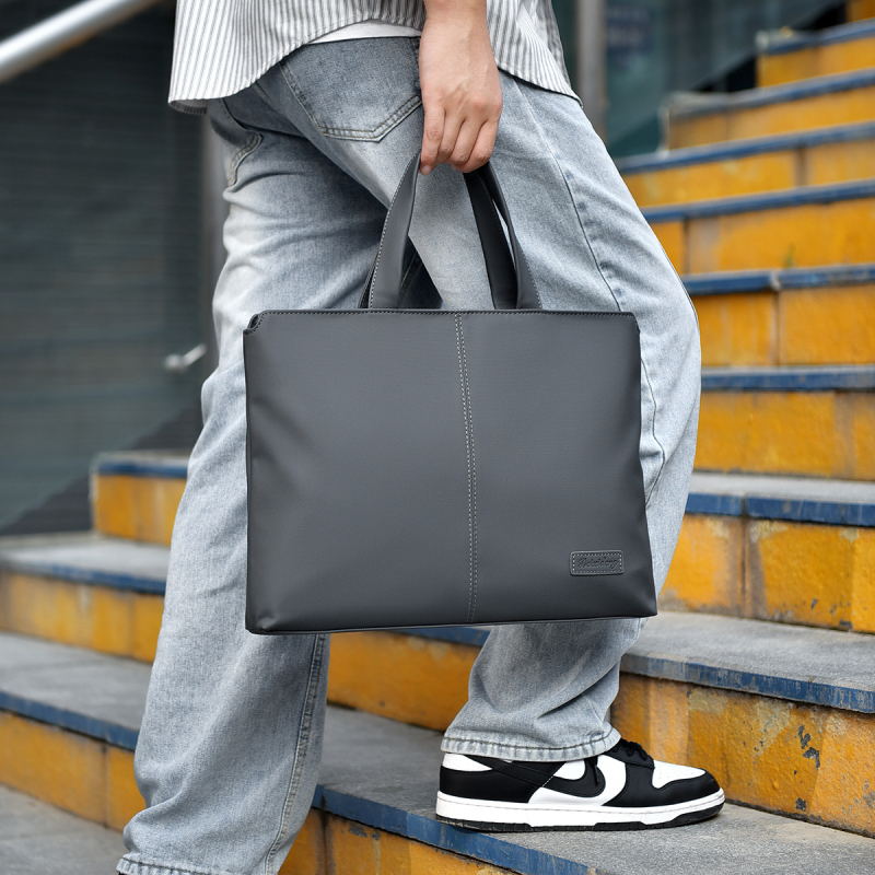 Nagykereskedelmi férfi üzleti alkalmi hordozható aktatáska, nagy kapacitású számítógéptáska, ajándékkonferencia, A4-es méretű kézi hordozó