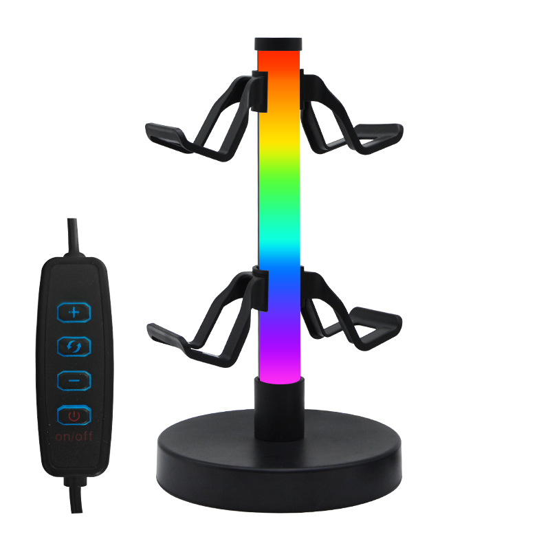 Pārrobežu tirgū pieprasīts RGB spēļu kontroliera statīvs, austiņu statīvs, apkārtējās vides apgaismojums, e-sporta ritma apgaismojums, galda lampa, naktslampiņa