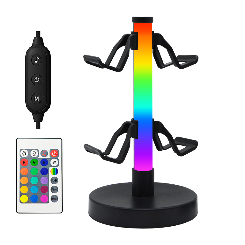 Pārrobežu tirgū pieprasīts RGB spēļu kontroliera statīvs, austiņu statīvs, apkārtējās vides apgaismojums, e-sporta ritma apgaismojums, galda lampa, naktslampiņa