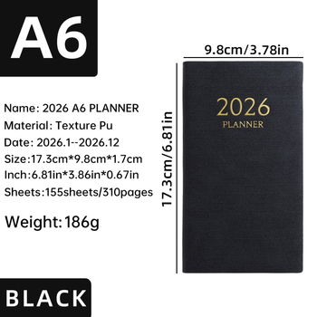 Laos olev 2026. aasta A6 formaadis ingliskeelne planeerija värvilise kuuindeksiga, paksendatud kalendriga, piiriülese teemapäevikuga