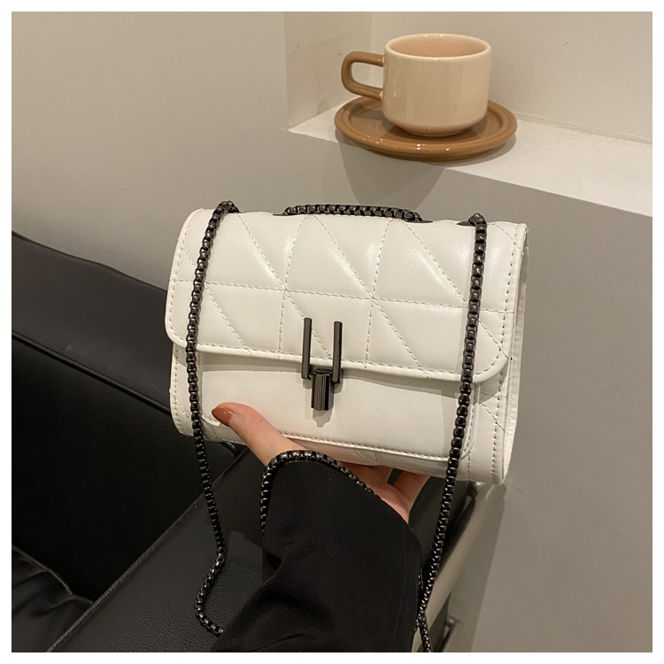 Piiriülene tipptasemel rombikujuline väike ruudukujuline kott naistele 2024. aasta uus moodne Chaneli stiilis õlakott, pendeldaja, universaalne ristikere kott