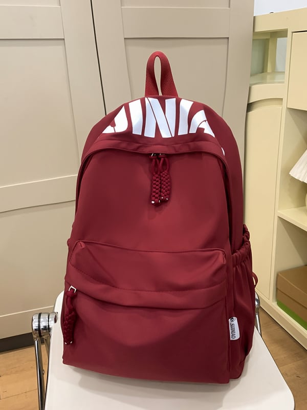 Jaapani stiilis lihtne, kõikvõimalik, suure mahutavusega, ühevärviline koolikott 2025. aasta kevadeks, uus kerge pendelrännakuga õpilase seljakott