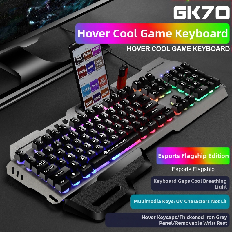 Virtuális tér kézi tartóval, USB porttal, világító fém játékmechanikus érzetű gombbal, játék billentyűzettel, egérrel, határokon átnyúló öltönnyel