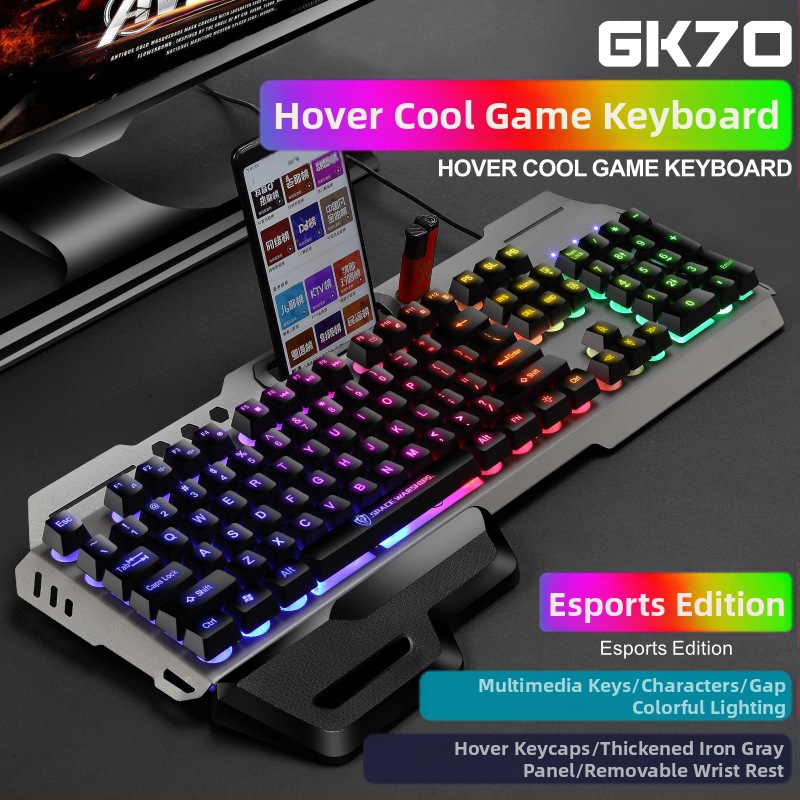 Virtuális tér kézi tartóval, USB porttal, világító fém játékmechanikus érzetű gombbal, játék billentyűzettel, egérrel, határokon átnyúló öltönnyel