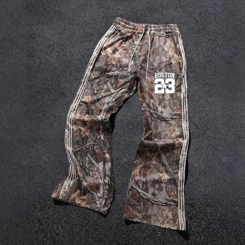 Európai és amerikai határokon átnyúló utcai hip-hop lezser nadrág levelekkel, betűmintás csíkos dizájn széles szárú nadrág laza nadrág