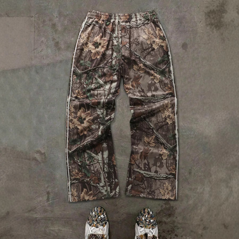 Európai és amerikai határokon átnyúló utcai hip-hop lezser nadrág levelekkel, betűmintás csíkos dizájn széles szárú nadrág laza nadrág