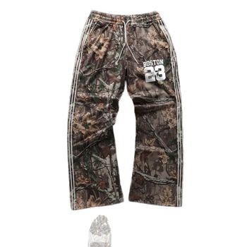 Európai és amerikai határokon átnyúló utcai hip-hop lezser nadrág levelekkel, betűmintás csíkos dizájn, széles szárú nadrág, laza nadrág