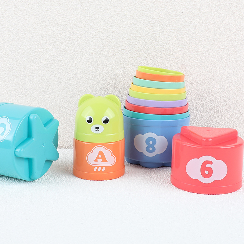 Ielas kioska vairumtirdzniecības kraušanas krūze Varavīksnes tornis Bērnu izglītojoša agrīnās izglītības bērnu rotaļlieta Bērnu gredzenu komplekts Krūzīšu kraušanas mūzika