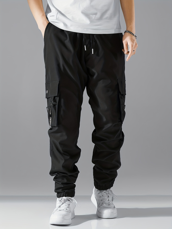 Meestele mõeldud piiriülesed tööpüksid, uus stiil igaks aastaajaks, Ameerika vabaaja dressipüksid, lahtised ja mitmekülgsed pikad püksid meesüliõpilastele, pluss-suuruses