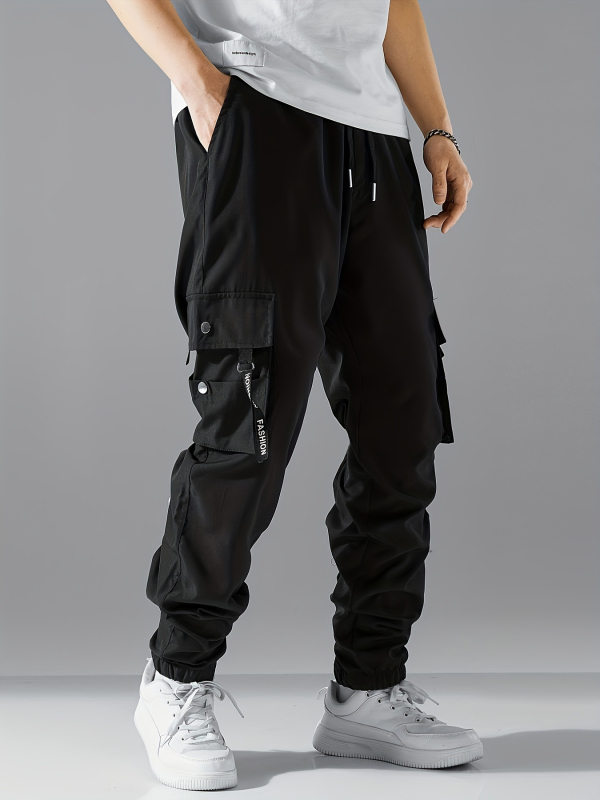 Meestele mõeldud piiriülesed tööpüksid, uus stiil igaks aastaajaks, Ameerika vabaaja dressipüksid, lahtised ja mitmekülgsed pikad püksid meesüliõpilastele, pluss-suuruses