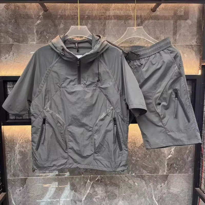 Suvine õhuke kapuutsiga lühikeste varrukatega ülikond meeste õues kasutamiseks mõeldud vabaaja hingav päikesekaitseriietus paaridele mõeldud universaalsed lühikesed püksid kaheosaline komplekt