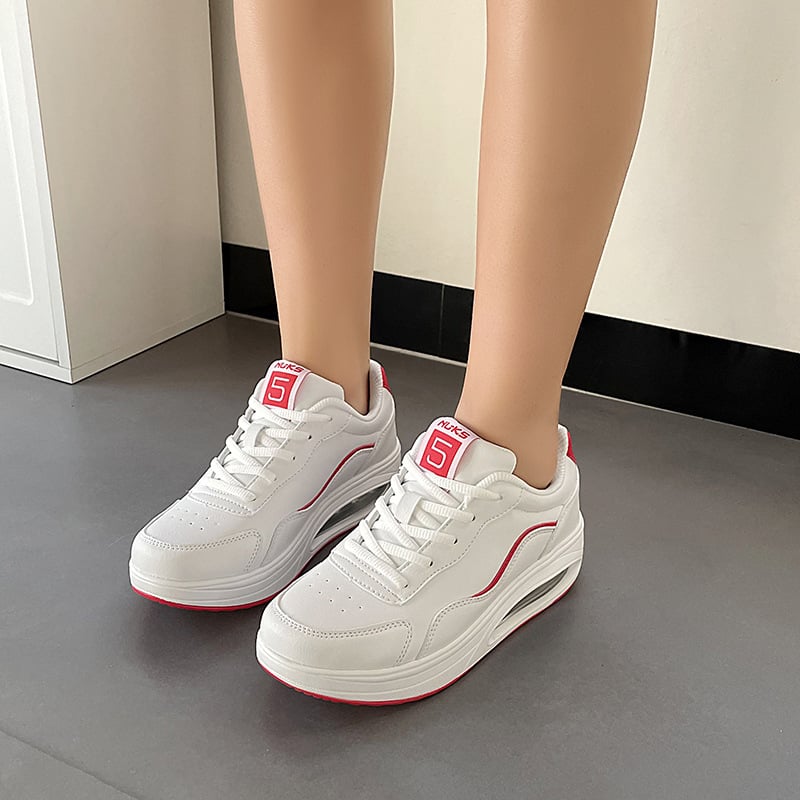 Quanzhou Jinjiang paksu tallaga naiste kingad õhkpadjaga lööke neeldavad kerged naiste kingad nahast pinnaga veekindlad libisemiskindlad kulumiskindlad vabaaja tossud naistele