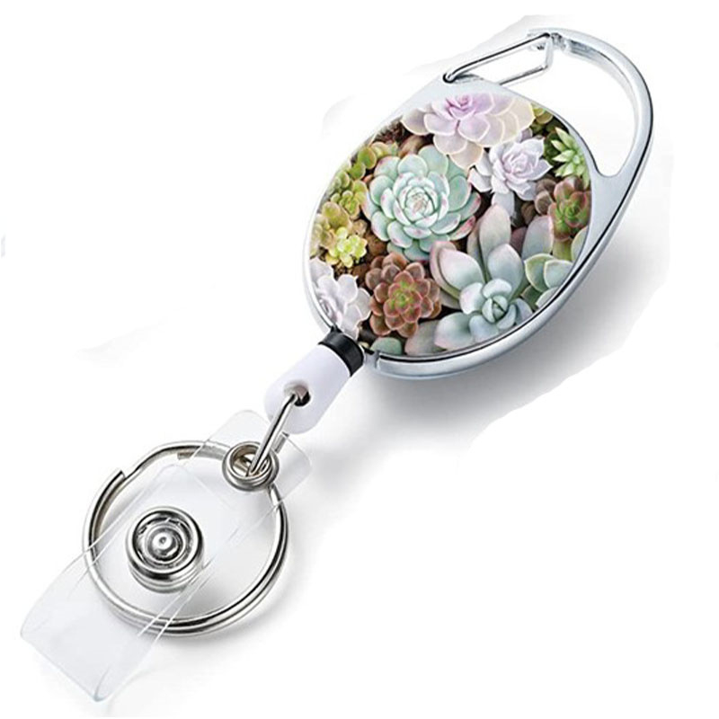 Tehase otsetrükiga logo, ovaalne, kergesti tõmmatav pandlaga, lilleline, sukulentne töömärgi pandla, vöö tagaklamber, võtmehoidja