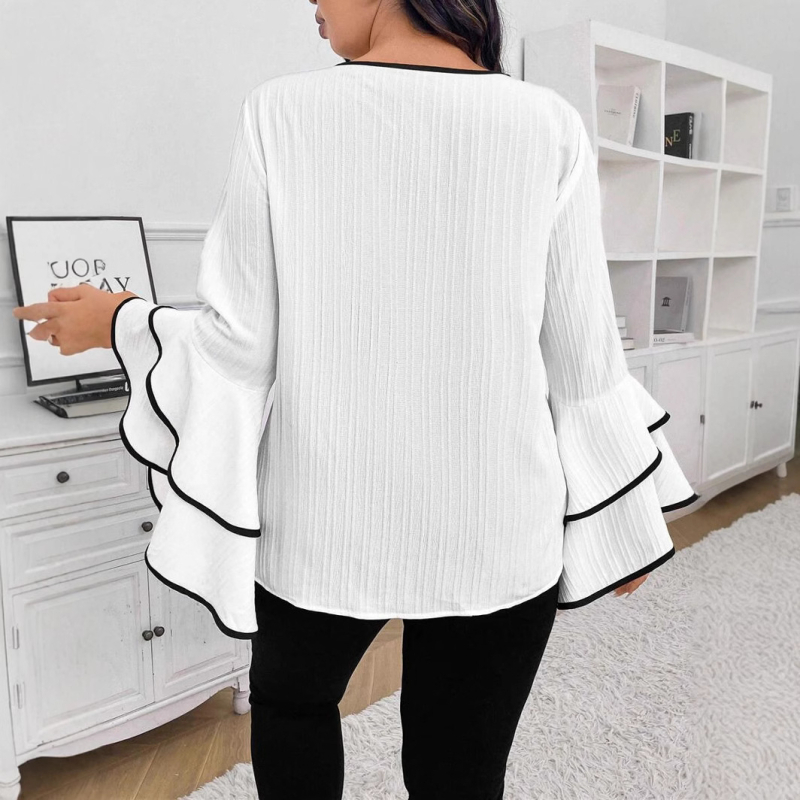 Prantsuse 2025. aasta kevadine uus Euroopa ja Ameerika moodne seltskonnadaamide temperamendidisain, mille mõte on suurte sarvedega lootoslehe varrukatega topp väliskaubanduseks