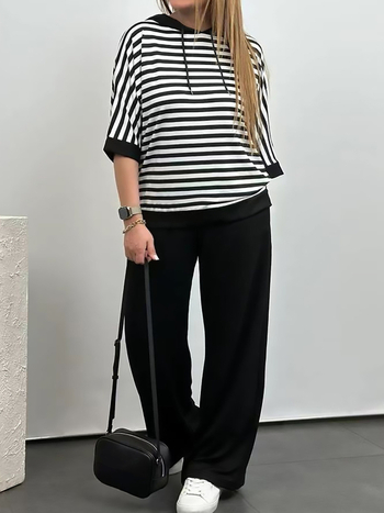 Euroopa ja Ameerika Amazoni sõltumatu jaama piiriülene dressipluus, lühikeste varrukatega, ühevärviline, kitsad sirged püksid, kaheosaline ülikond