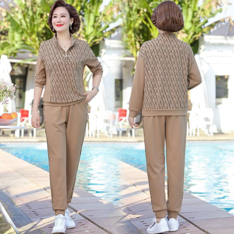 Noore ema kevadmantel keskealistele ja eakatele vabaaja spordiriietus Naiste kevad- ja sügiskostüüm keskealistele naistele lääne stiilis kaheosaline ülikond