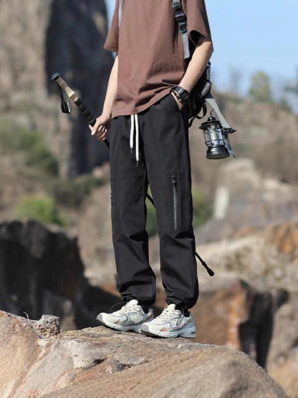 Veekindlad ja tuulekindlad nelja aastaaja moodsad matkapüksid, lahtised pluss-suuruses pikad püksid, laia säärega mitmekülgsed vabaajapüksid