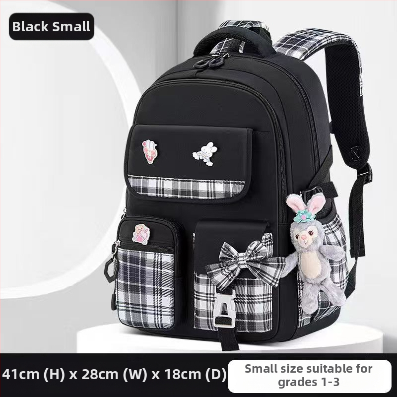 Hulgimüügis olevad algkooliõpilaste koolikotid, naismudelid, armas koomiksiga lips, suure mahutavusega, koormust vähendav seljakott, selgroogu kaitsev laste seljakott