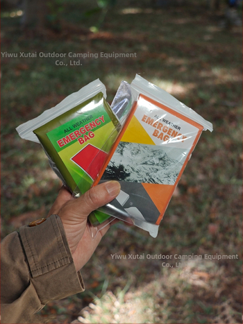 Õues PE alumiiniumkilest hädaolukorra magamiskott Lihtne külmakindel katastroofiabi hädaolukorra soe magamiskott Vihmamantli telk Hoiustamine Amazon