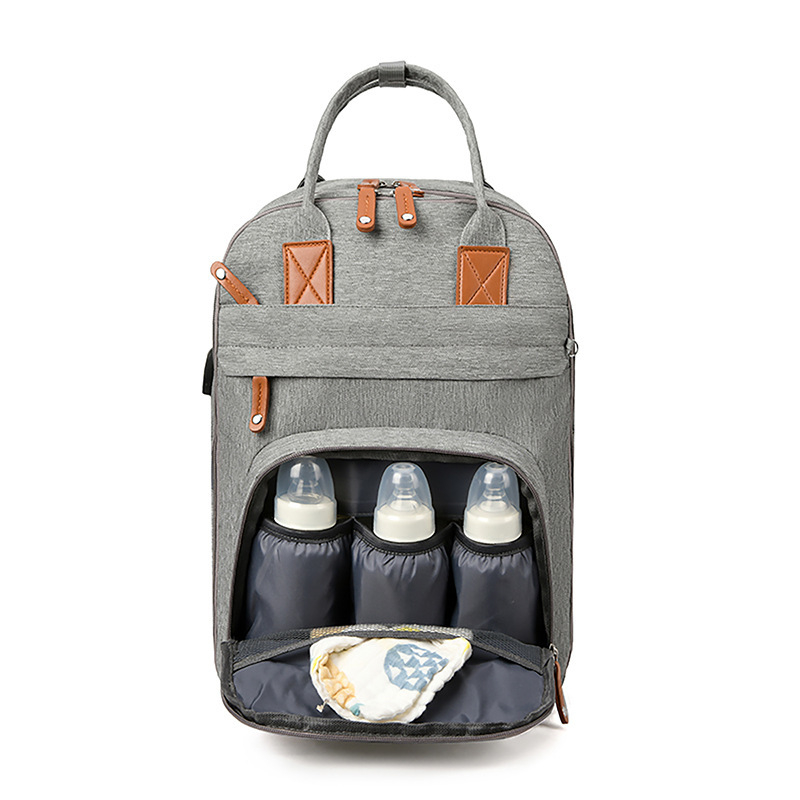 Piiriülene uus multifunktsionaalne kaasaskantav emmekott, Baoma seljakott, suure mahutavusega ema- ja beebikott uriinipadjaga