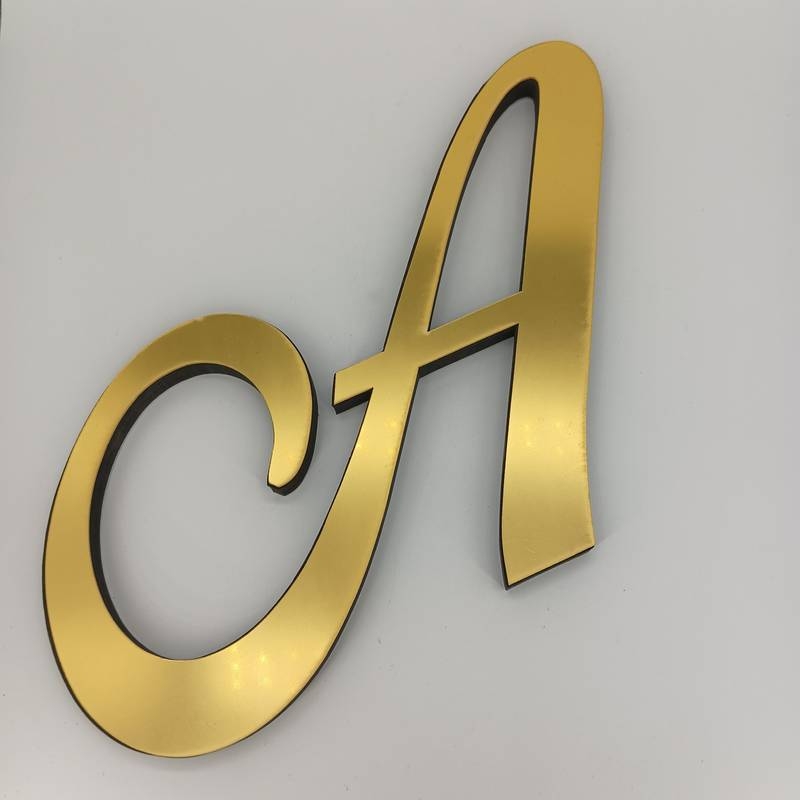 Naujas tarpvalstybinis produktas – auksinis akrilinis žolės raidės veidrodžio lipdukas svetainei, miegamajam, lipnus 3D stereo dekoratyvinis sienos lipdukas