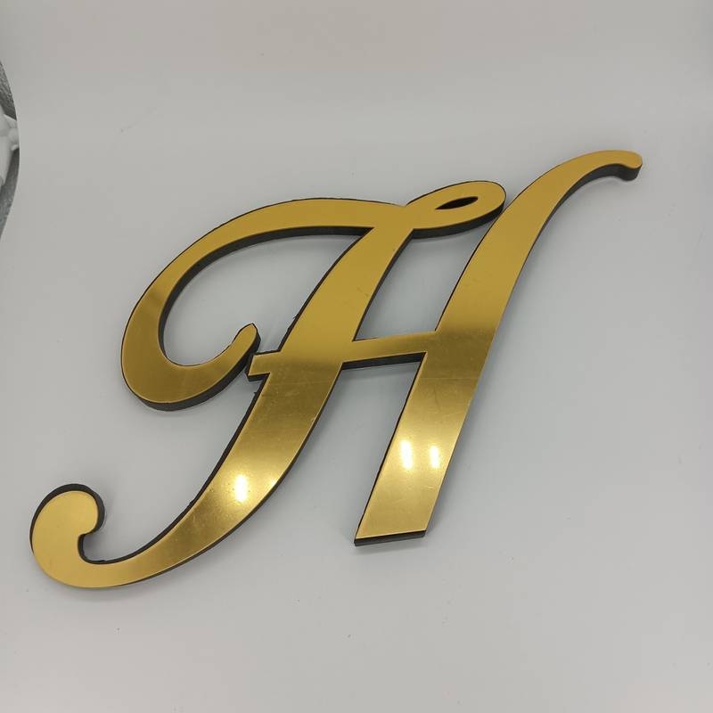 Naujas tarpvalstybinis produktas – auksinis akrilinis žolės raidės veidrodžio lipdukas svetainei, miegamajam, lipnus 3D stereo dekoratyvinis sienos lipdukas